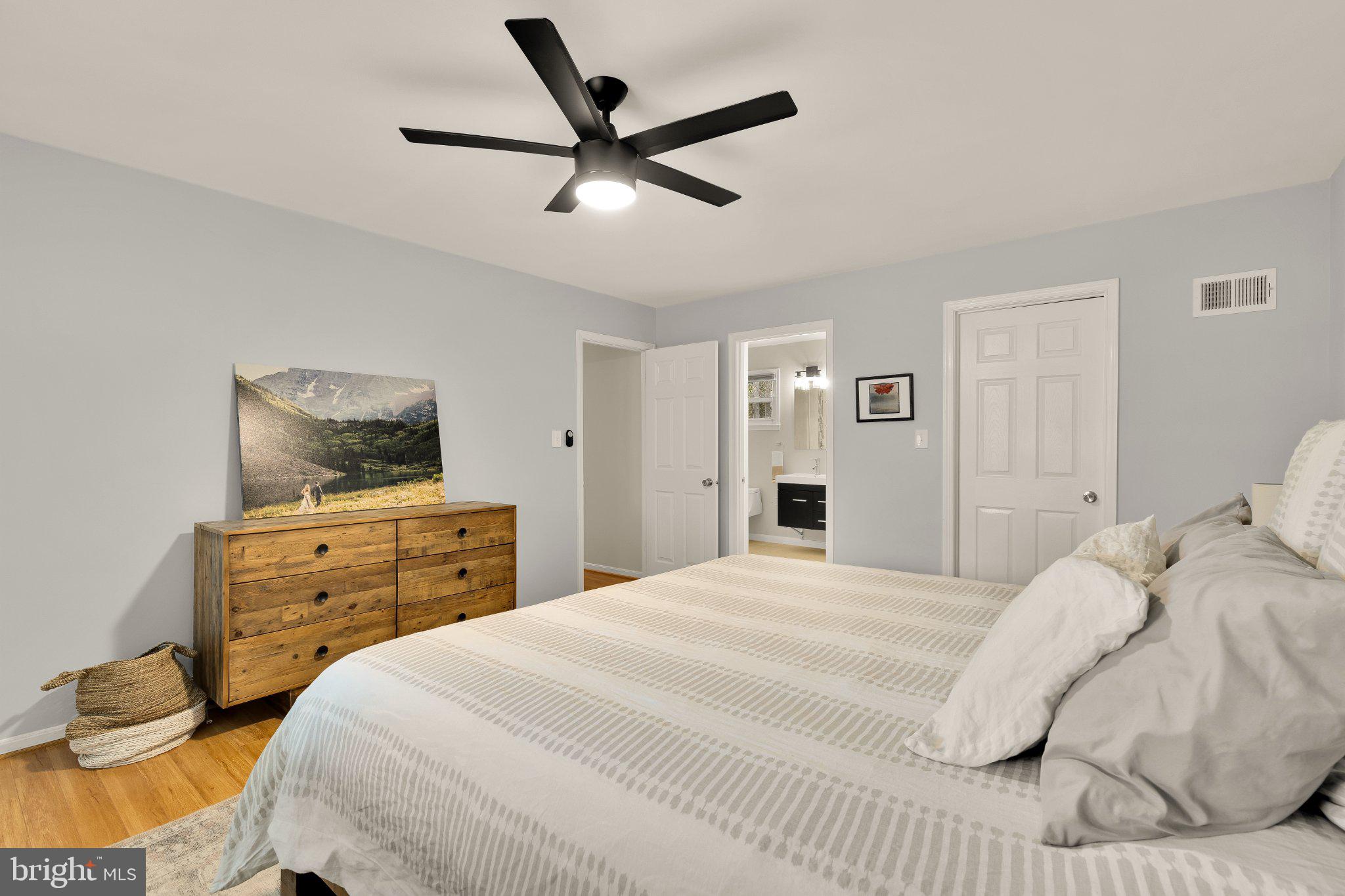6800 Riata Court Springfield, VA 22153 - Photo 17 of 37 Serene bedroom with modern touches.