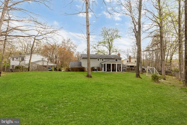 a view of a big yard with a house