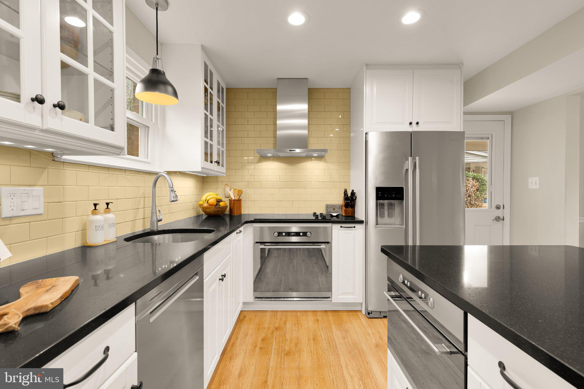 6800 Riata Court Springfield, VA 22153 - Photo 7 of 37 Modern kitchen with sleek finishes.