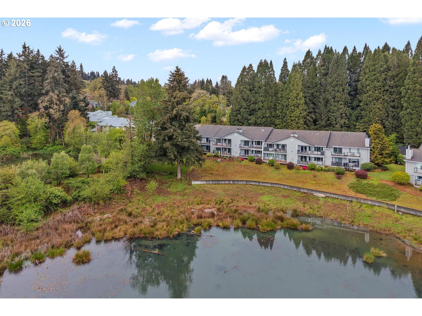 1840 Rees Hill Road Southeast, Unit 19 Salem, OR 97306 - Photo 28 of 34 a view of a lake with houses