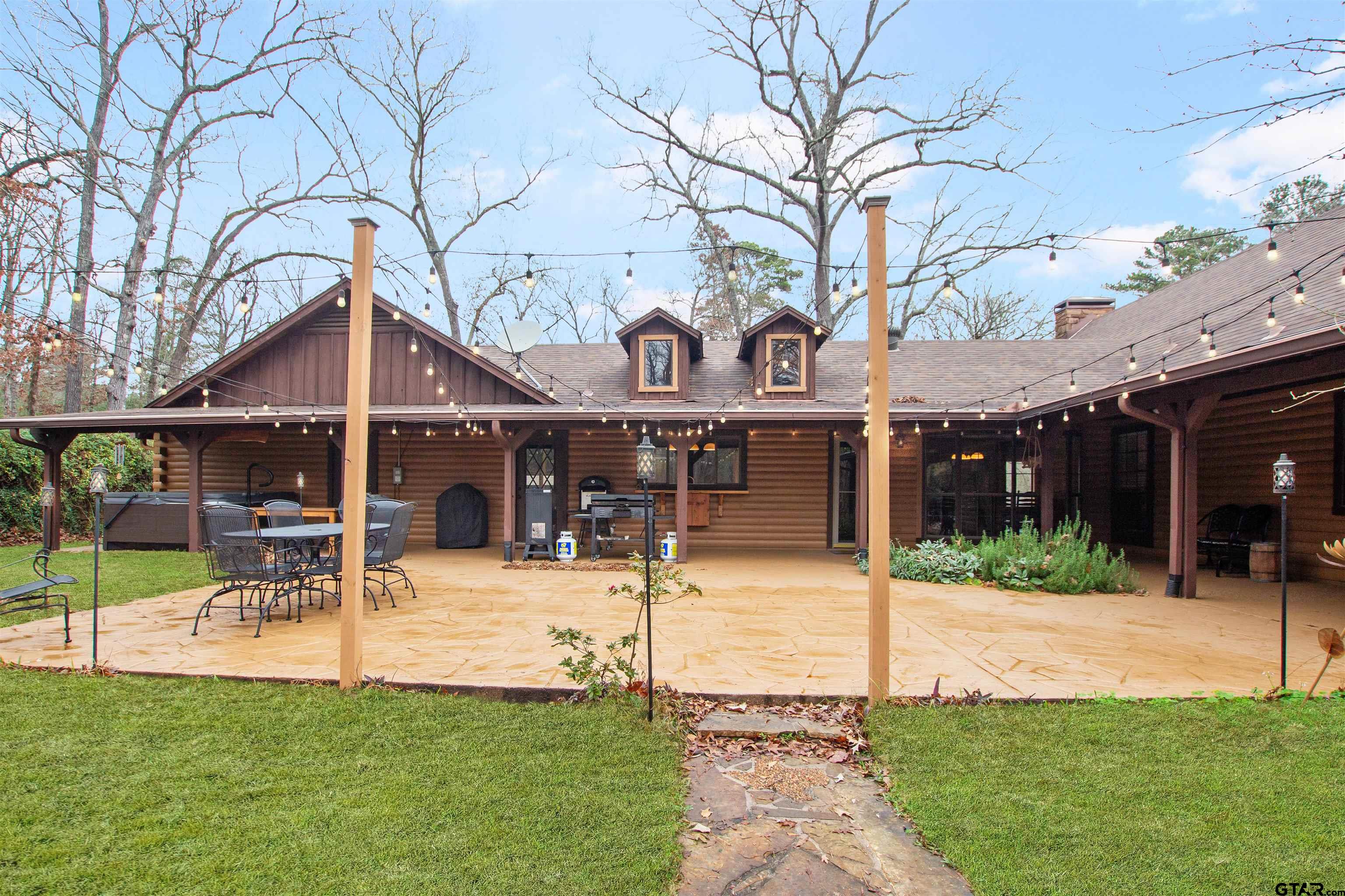 782 Rosie Wady Road Gladewater, TX 75647 - Photo 25 of 41 a view of a building with a yard