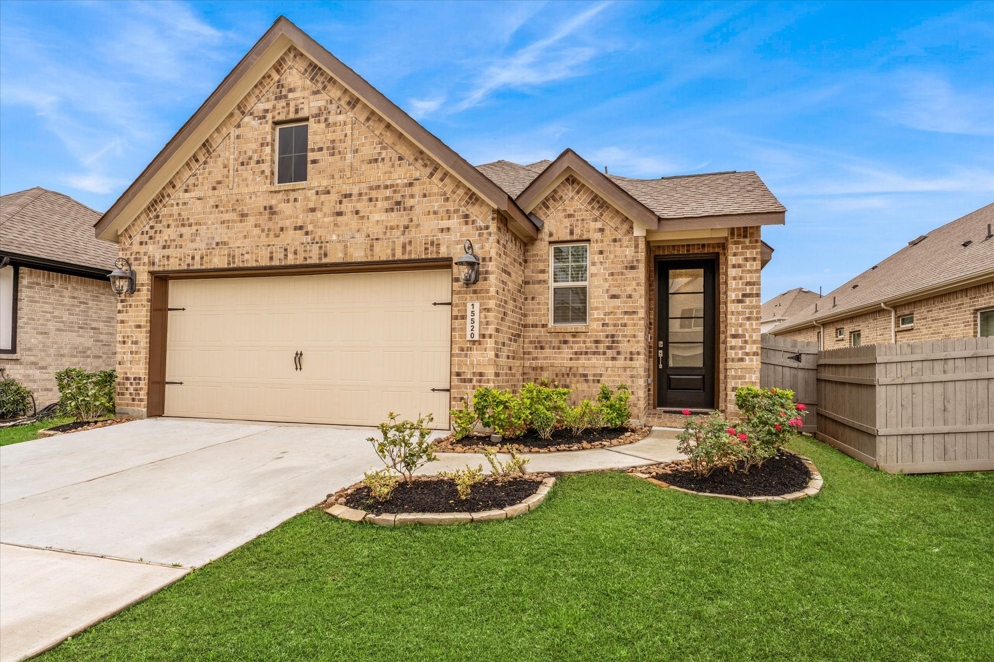 15520 Sunset Maple Court Conroe, TX 77302 - Photo 30 of 46 a front view of a house with a yard