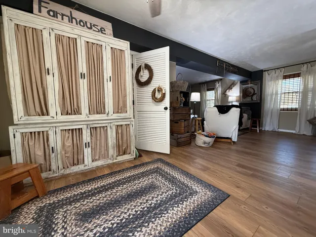 a bedroom with a bed and a walk in closet