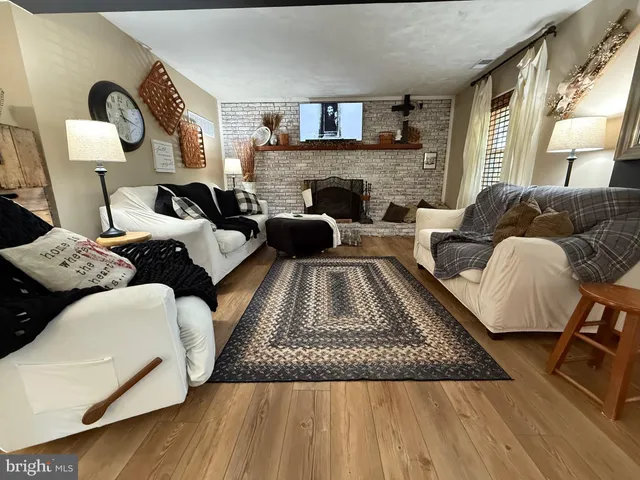 a kitchen with stainless steel appliances a refrigerator sink and cabinets