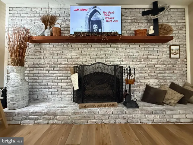 a kitchen with a sink and a stove top oven