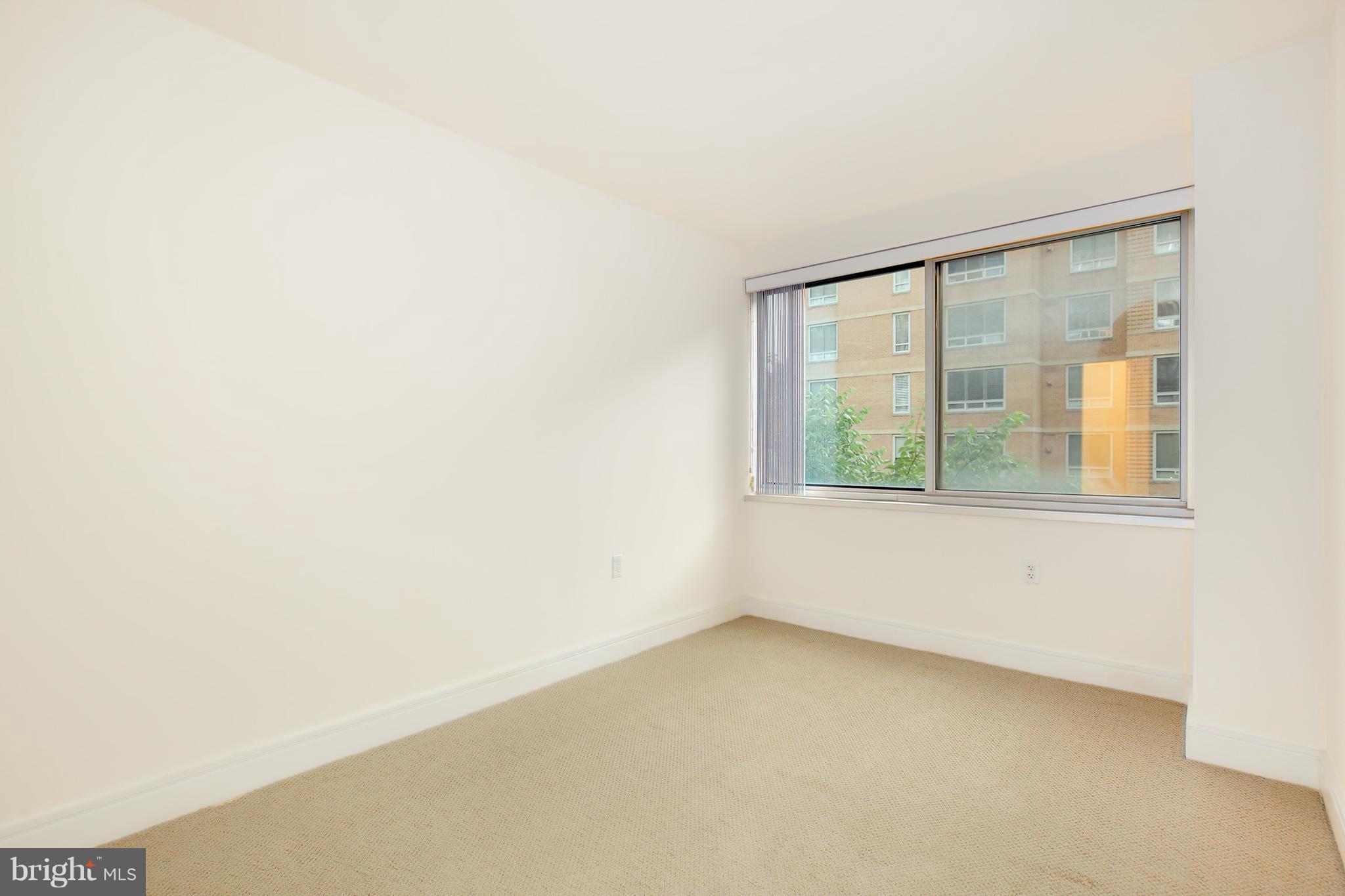 800 4th Street Southwest, Unit S113 Washington, DC 20024 - Photo 15 of 22 a view of an empty room with a window