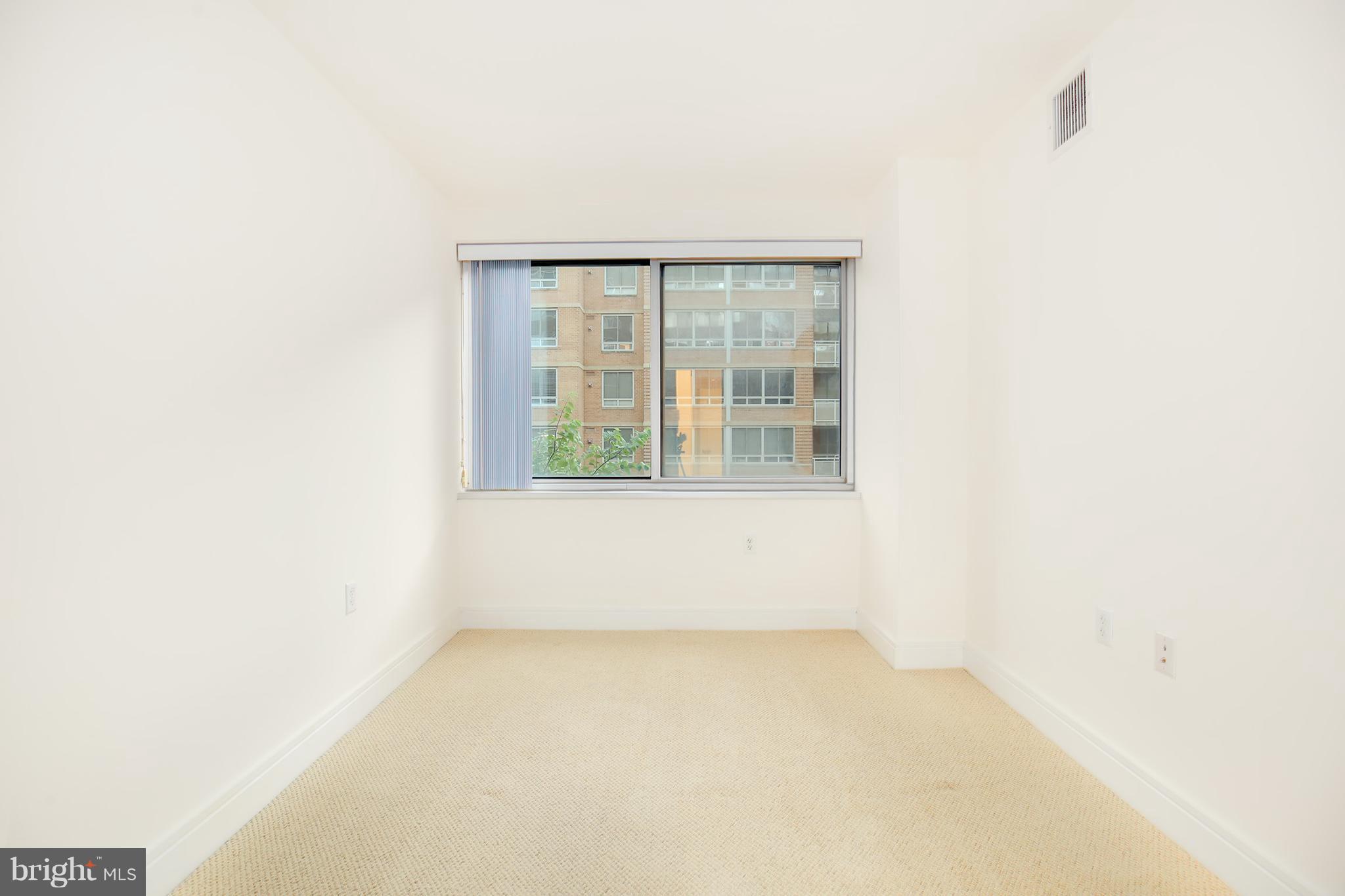 800 4th Street Southwest, Unit S113 Washington, DC 20024 - Photo 16 of 22 a view of an empty room with a window