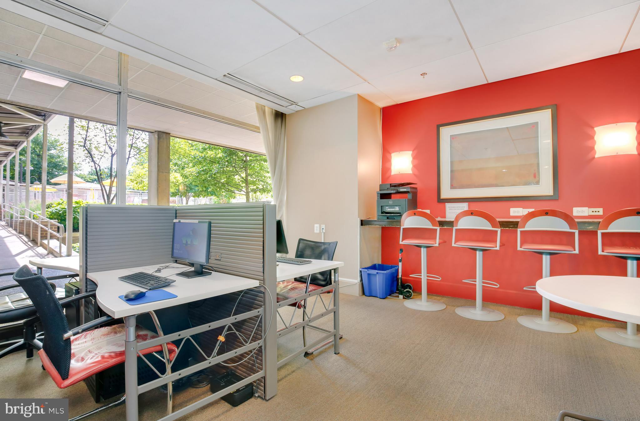 800 4th Street Southwest, Unit S113 Washington, DC 20024 - Photo 21 of 22 a bed room with furniture and a chandelier