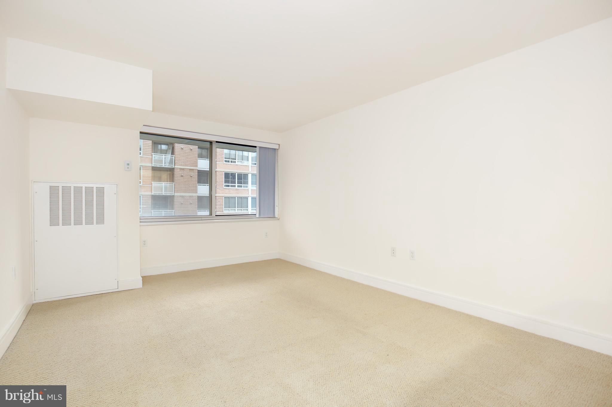 800 4th Street Southwest, Unit S113 Washington, DC 20024 - Photo 9 of 22 an empty room with windows
