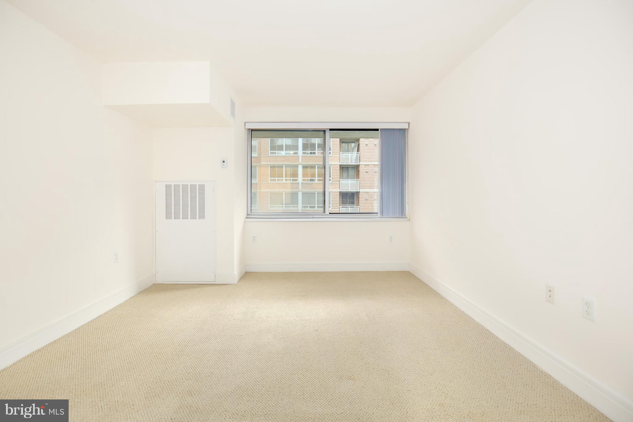 800 4th Street Southwest, Unit S113 Washington, DC 20024 - Photo 10 of 22 an empty room with a window