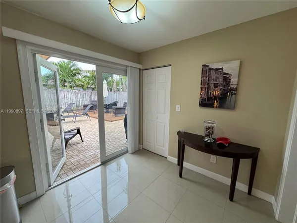 a living room with furniture and a gate