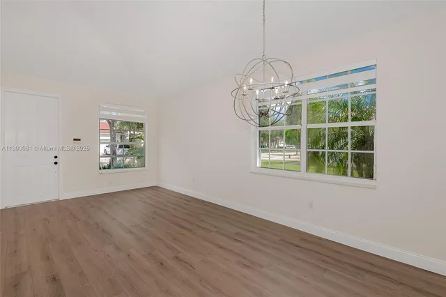a kitchen with a stove and a microwave