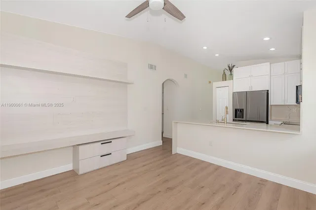 a bathroom with a sink and a large mirror