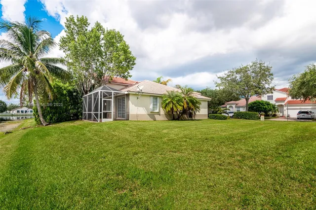 a view of a lake with a big yard