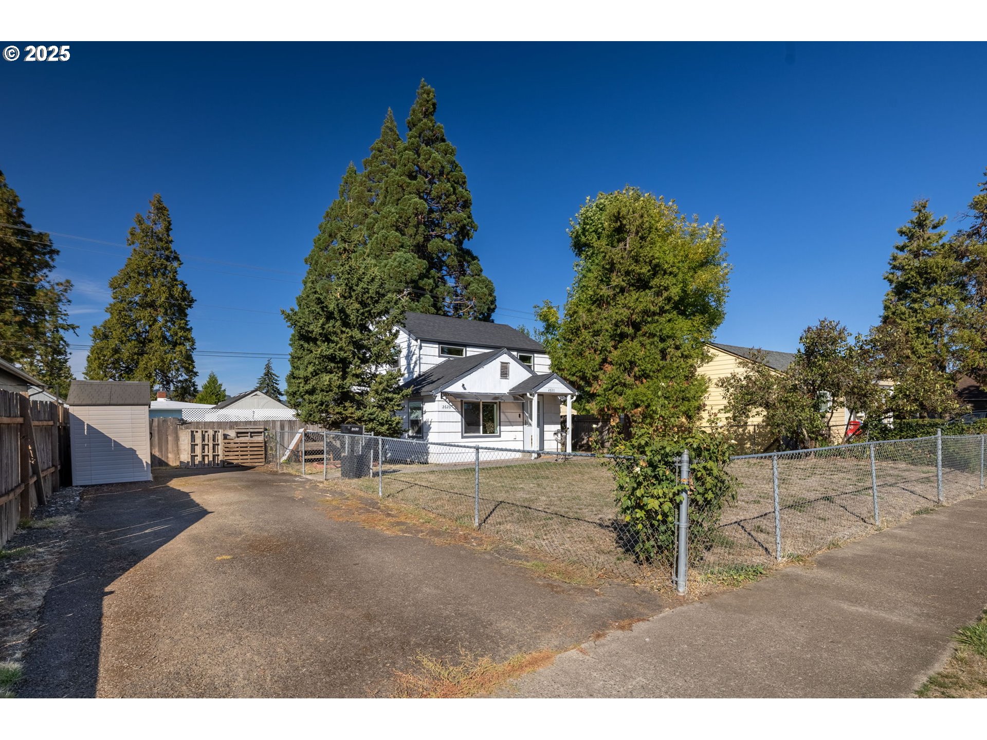 2620 E Street Springfield, OR 97477 - Photo 3 of 45 a view of a outdoor space and a yard
