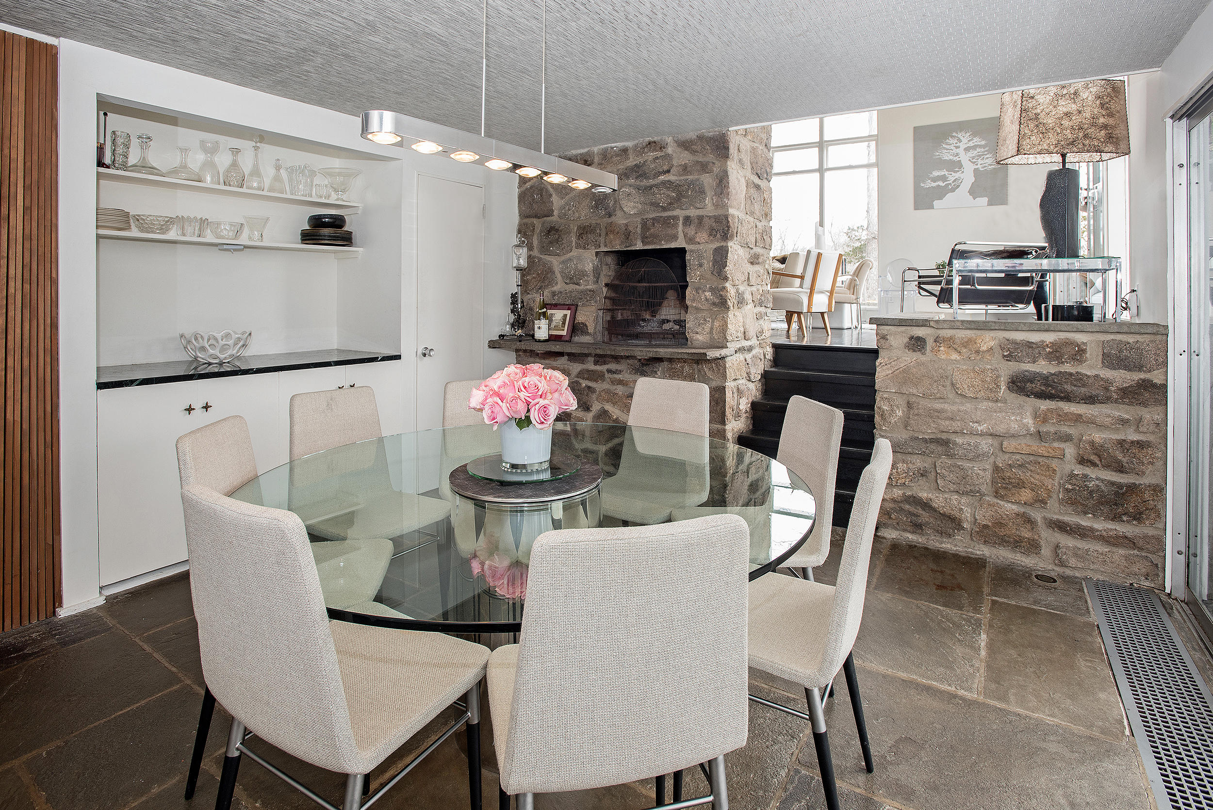 46 Benedict Hill Road New Canaan, CT 06840 - Photo 11 of 50 a dining room with furniture a large window and a kitchen view