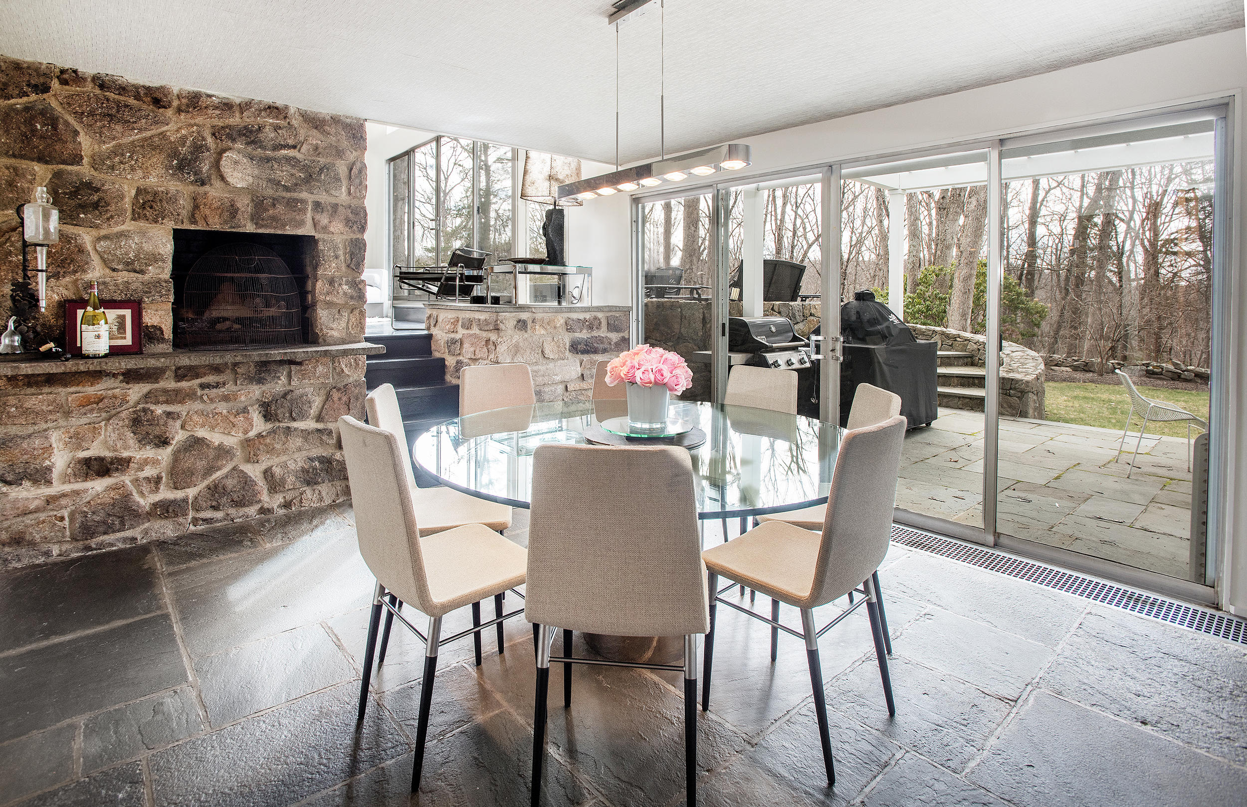 46 Benedict Hill Road New Canaan, CT 06840 - Photo 12 of 50 a view of a dining room with furniture window and outside view