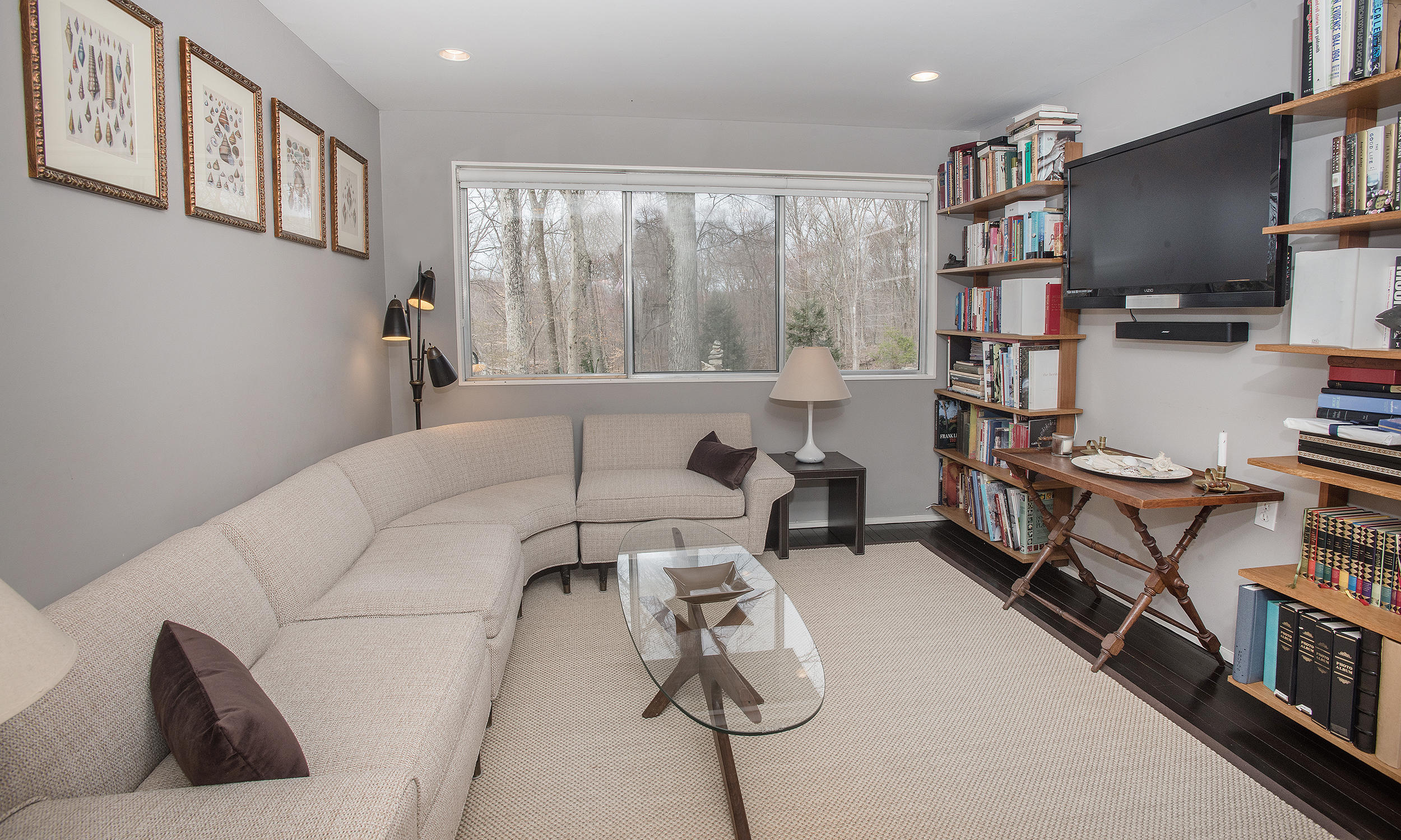 46 Benedict Hill Road New Canaan, CT 06840 - Photo 13 of 50 a living room with furniture a flat screen tv and a window