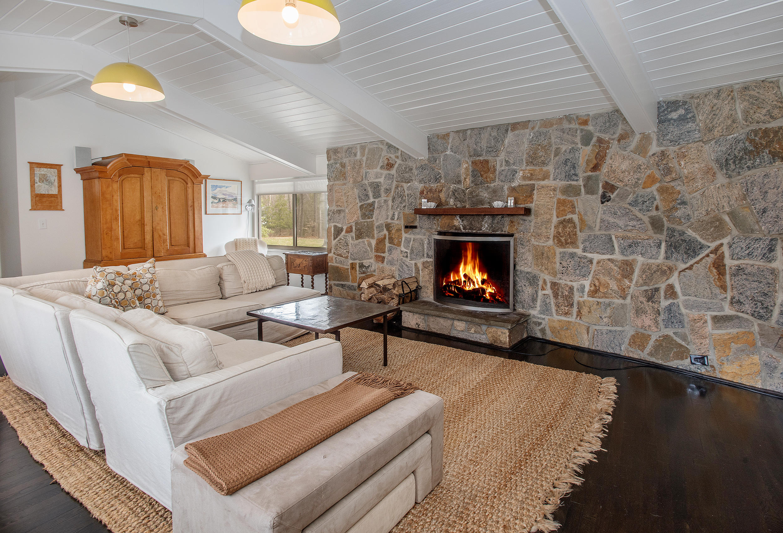 46 Benedict Hill Road New Canaan, CT 06840 - Photo 14 of 50 a living room with furniture and a fireplace