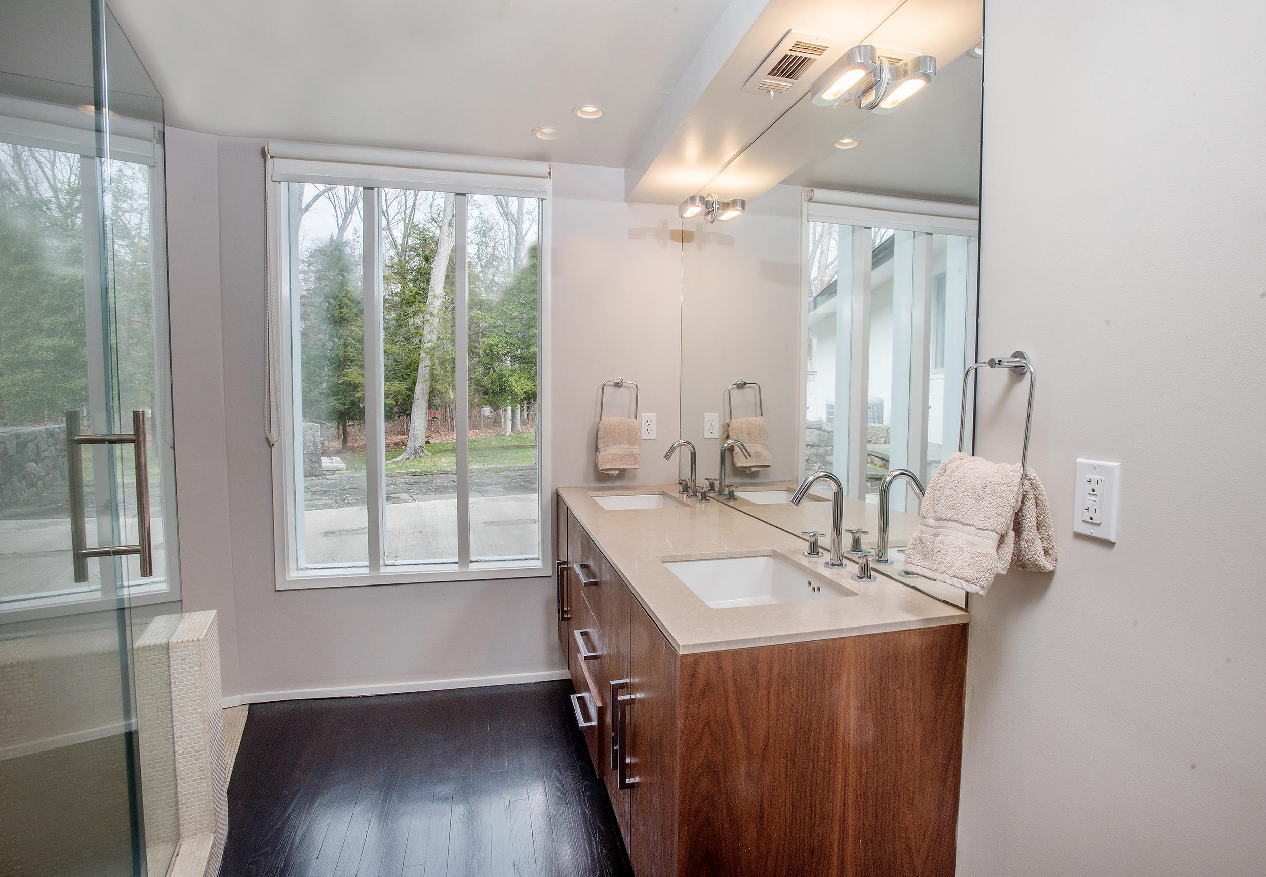 46 Benedict Hill Road New Canaan, CT 06840 - Photo 19 of 50 a bathroom with a sink double vanity and a mirror