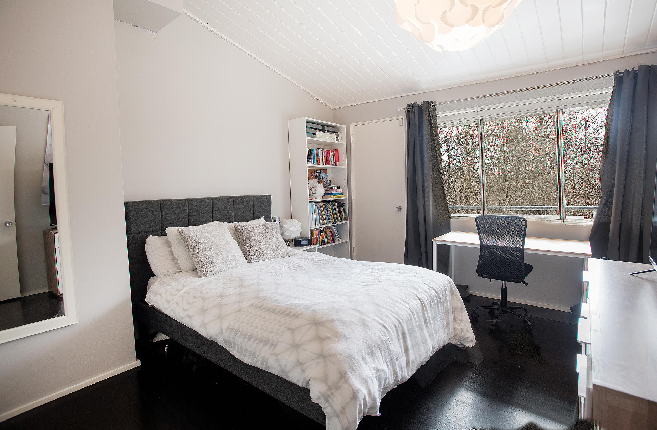 46 Benedict Hill Road New Canaan, CT 06840 - Photo 21 of 50 a bedroom with a large bed and a large window