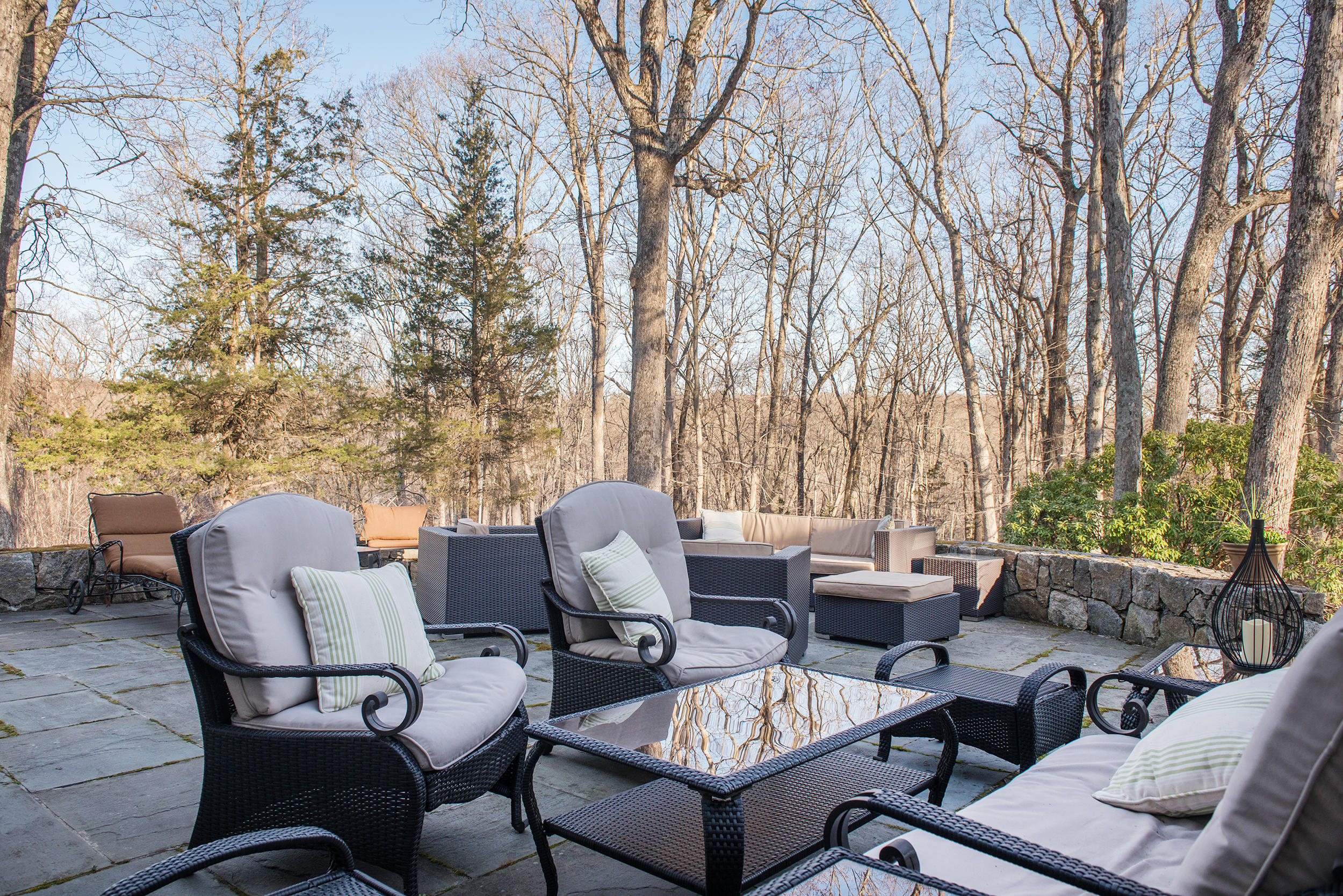 46 Benedict Hill Road New Canaan, CT 06840 - Photo 32 of 50 a backyard of a house with table and chairs