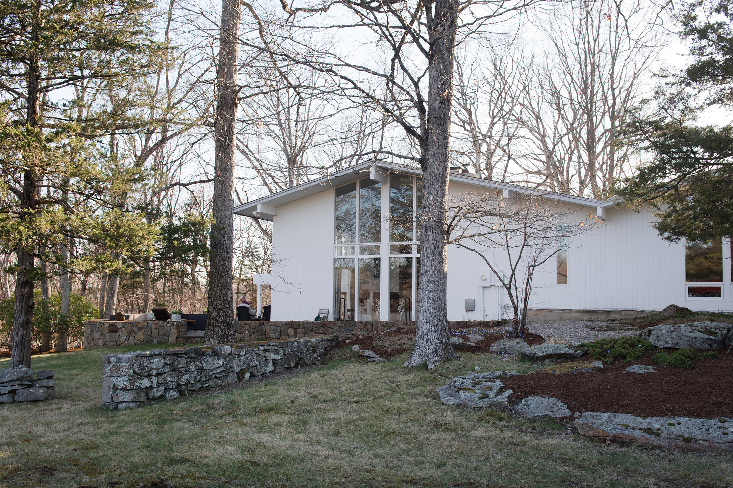 46 Benedict Hill Road New Canaan, CT 06840 - Photo 35 of 50 a front view of a house with garden