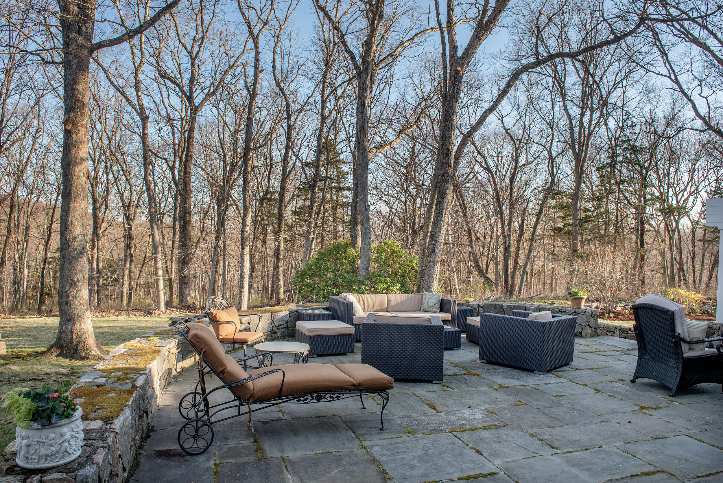 46 Benedict Hill Road New Canaan, CT 06840 - Photo 36 of 50 a view of a patio with chairs and tables