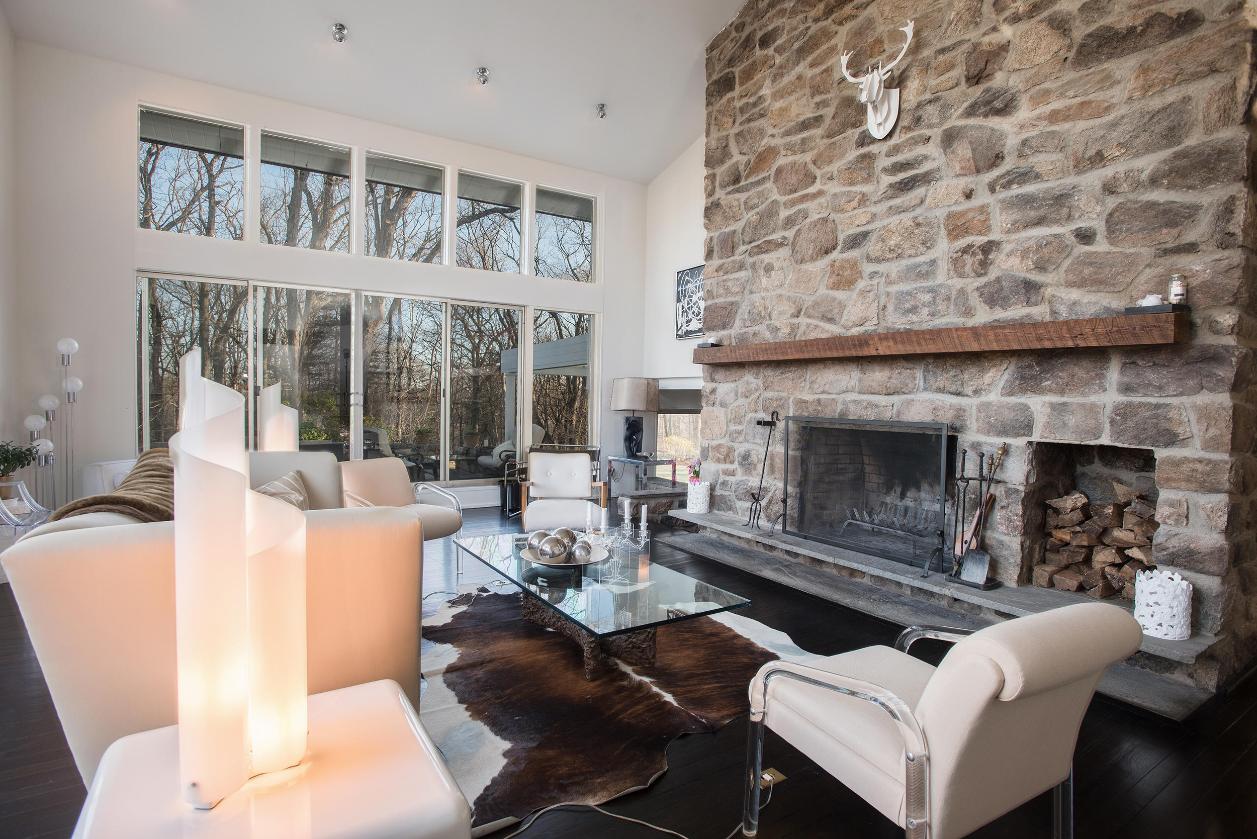 46 Benedict Hill Road New Canaan, CT 06840 - Photo 5 of 50 a living room with furniture and a fireplace