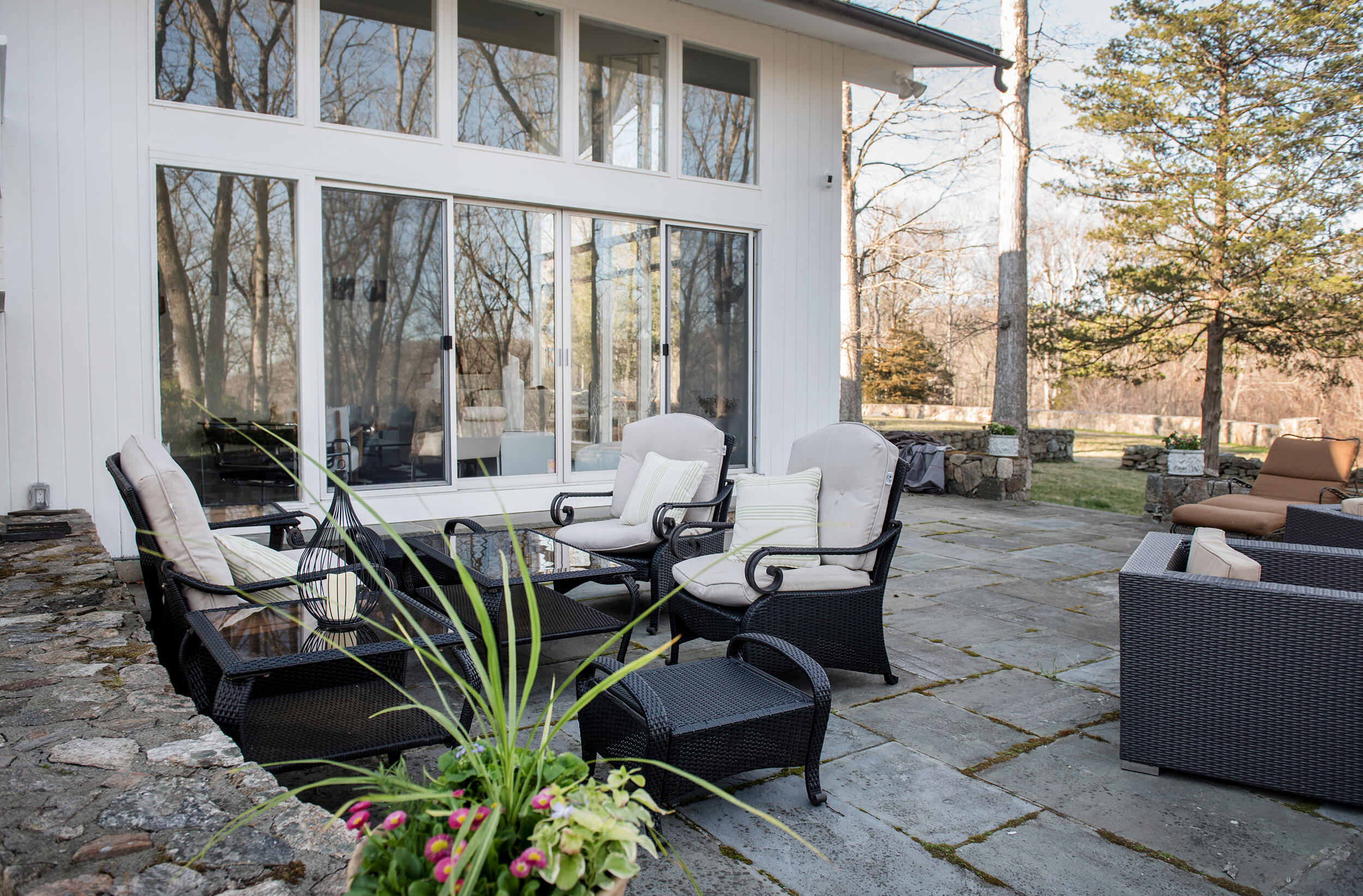 46 Benedict Hill Road New Canaan, CT 06840 - Photo 41 of 50 a view of a patio with couches and potted plants