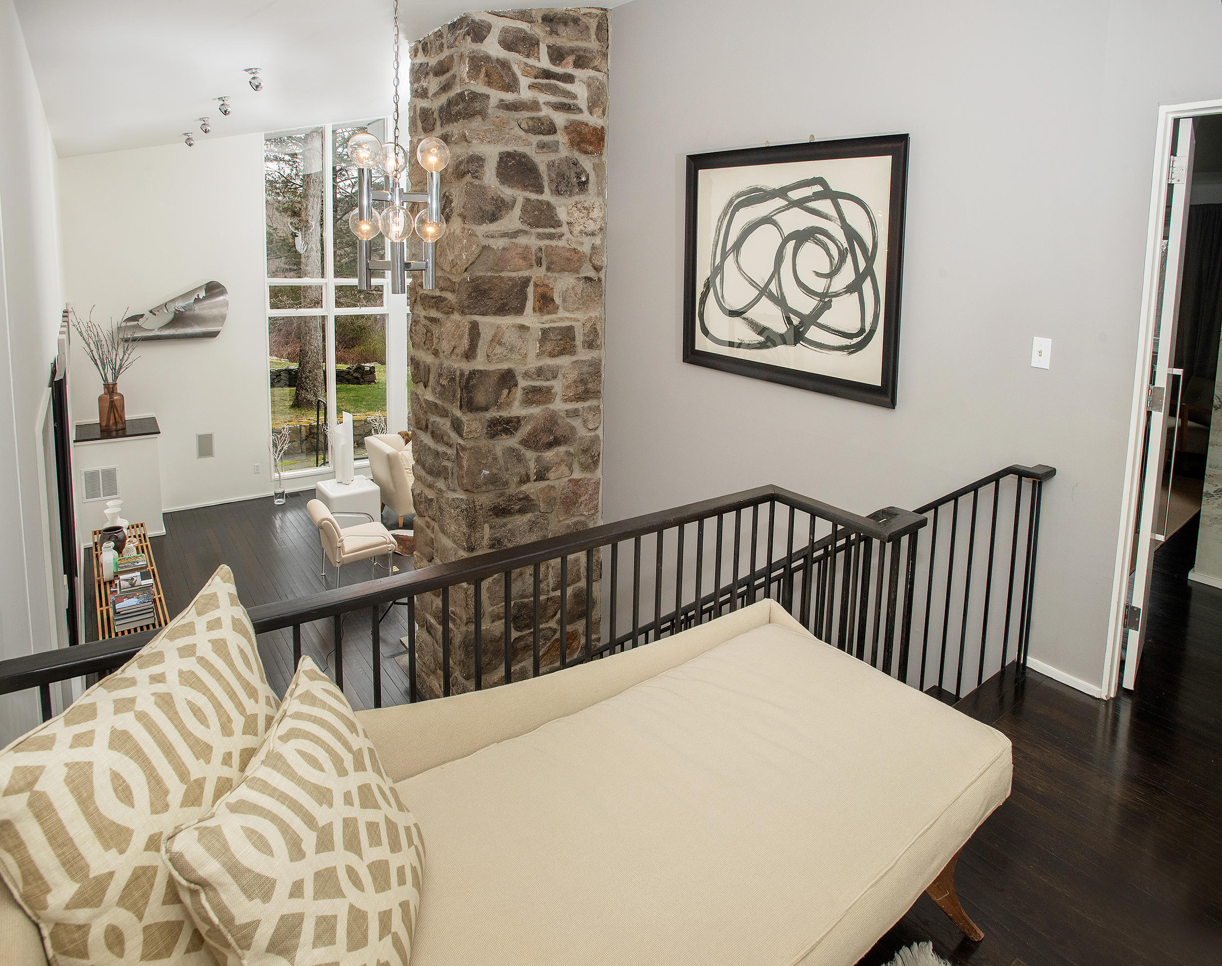 46 Benedict Hill Road New Canaan, CT 06840 - Photo 6 of 50 a bedroom with a bed and a table in it