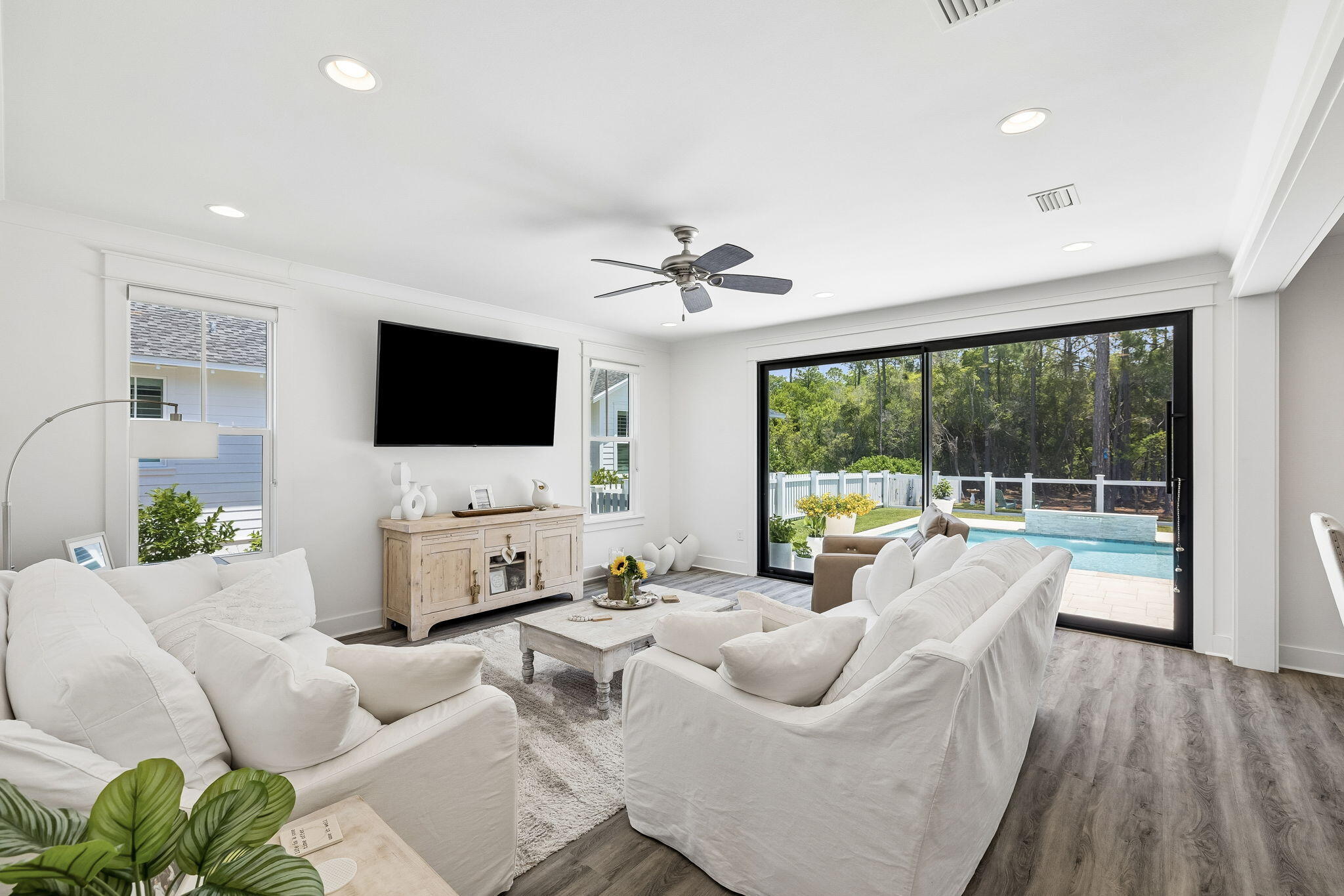 115 Log Landing St Inlet Beach Inlet Beach, FL 32461 - Photo 5 of 69 a living room with furniture a flat screen tv and a large window