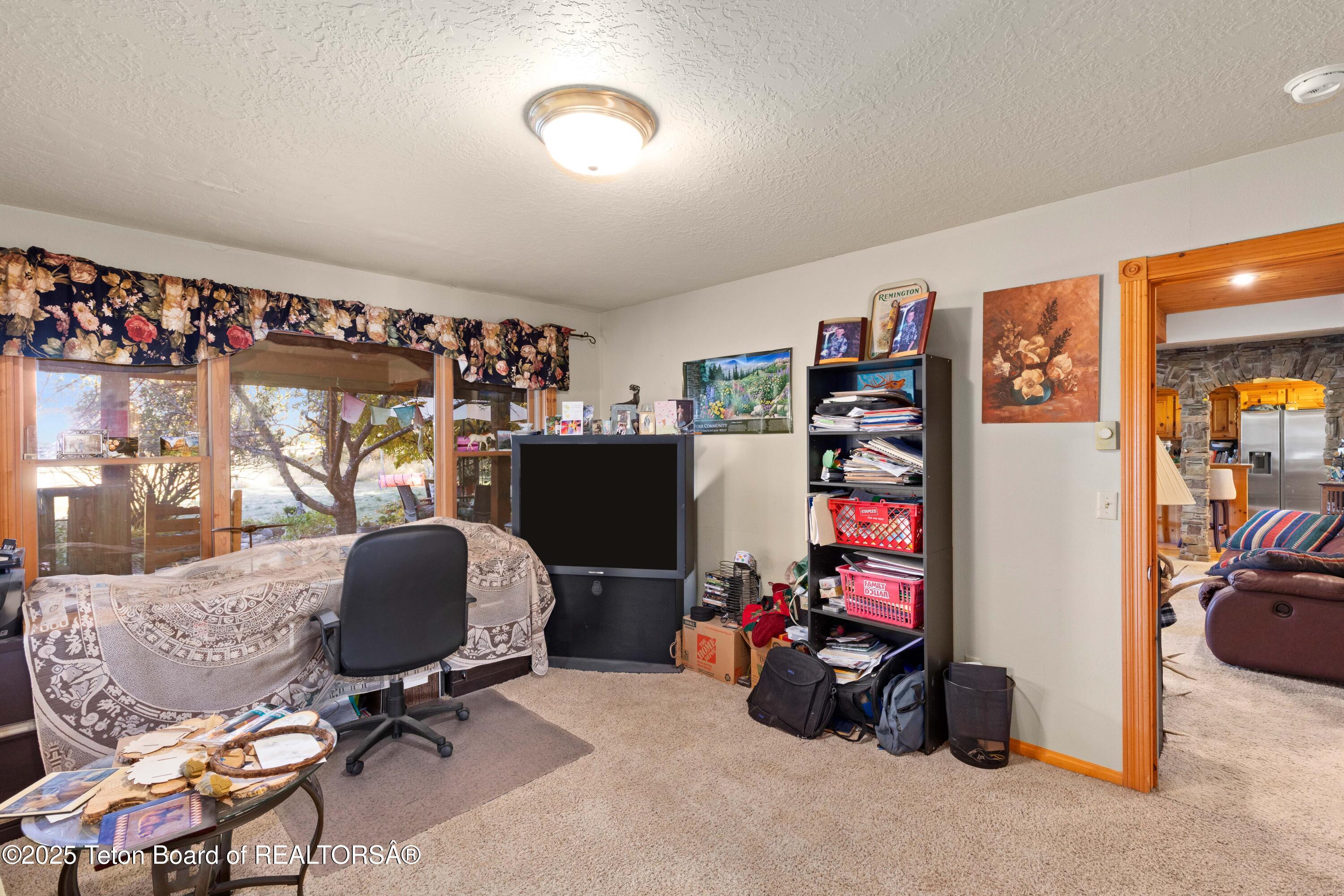 83 Buck Lane Alpine, WY 83128 - Photo 31 of 75 83 Buck Ln Main Floor Bdrm