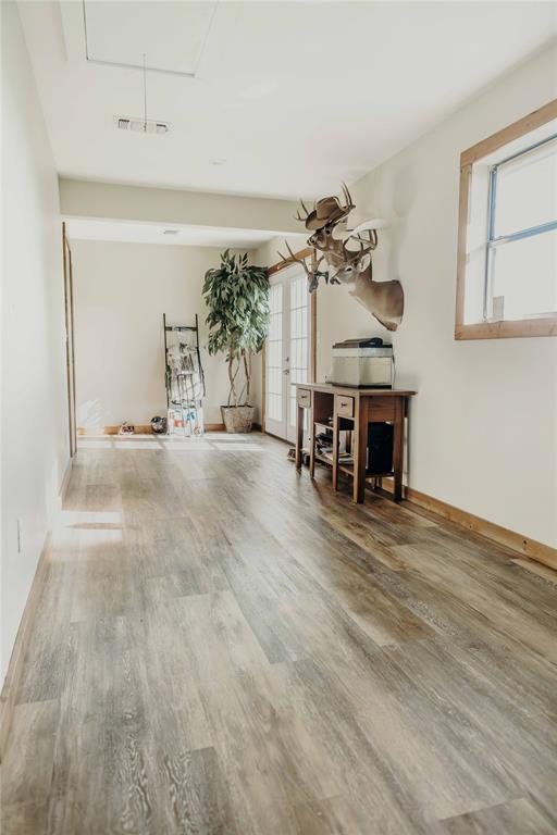 1740 Highway 2247 Comanche, TX 76442 - Photo 20 of 36 a view of a livingroom with furniture and a potted plant