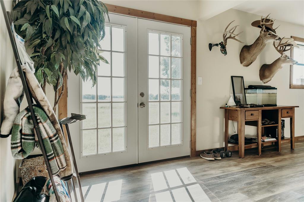 1740 Highway 2247 Comanche, TX 76442 - Photo 5 of 36 a view of entryway with wooden floor