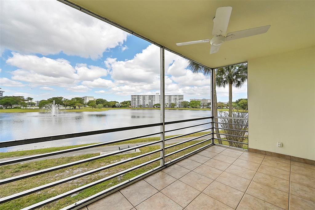 2801 North Palm Aire Drive, Unit 201 Pompano Beach, FL 33069 - Photo 17 of 19 a view of outdoor space with seating