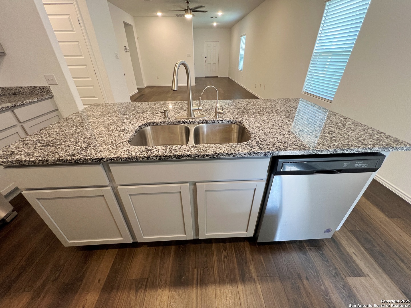 4422 Chandler Road, Unit 4 San Antonio, TX 78222 - Photo 12 of 31 a kitchen with stainless steel appliances granite countertop a sink and a granite counter tops