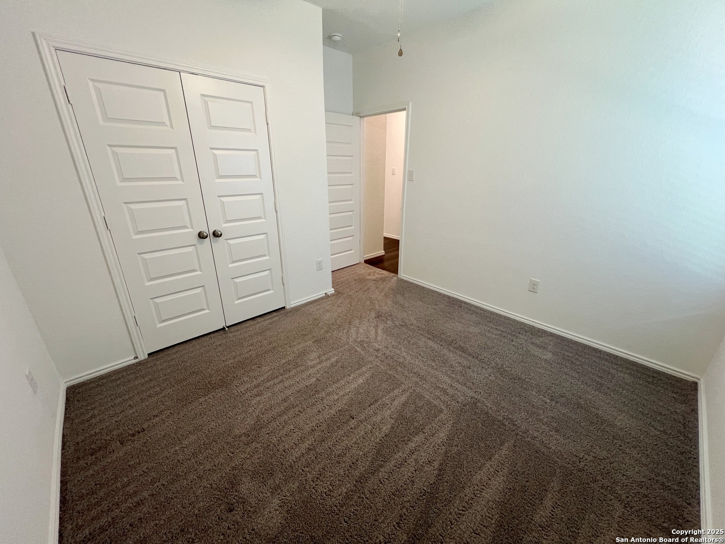 4422 Chandler Road, Unit 4 San Antonio, TX 78222 - Photo 17 of 31 an empty room with closet area