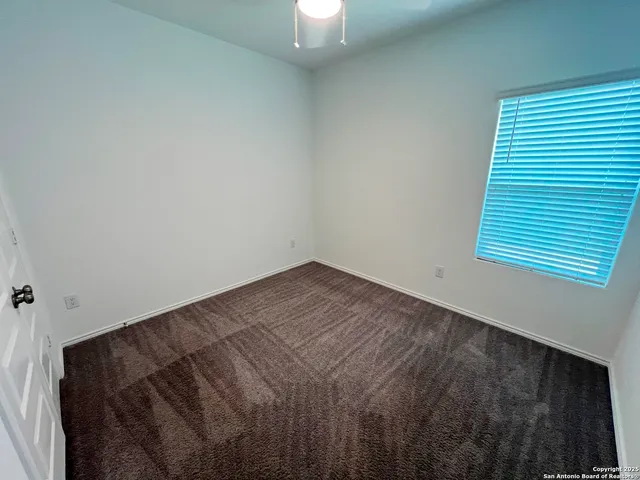 a view of empty room with window