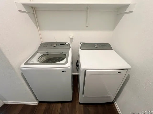 a utility room with dryer and washer