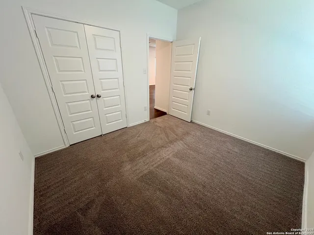 an empty room with closet