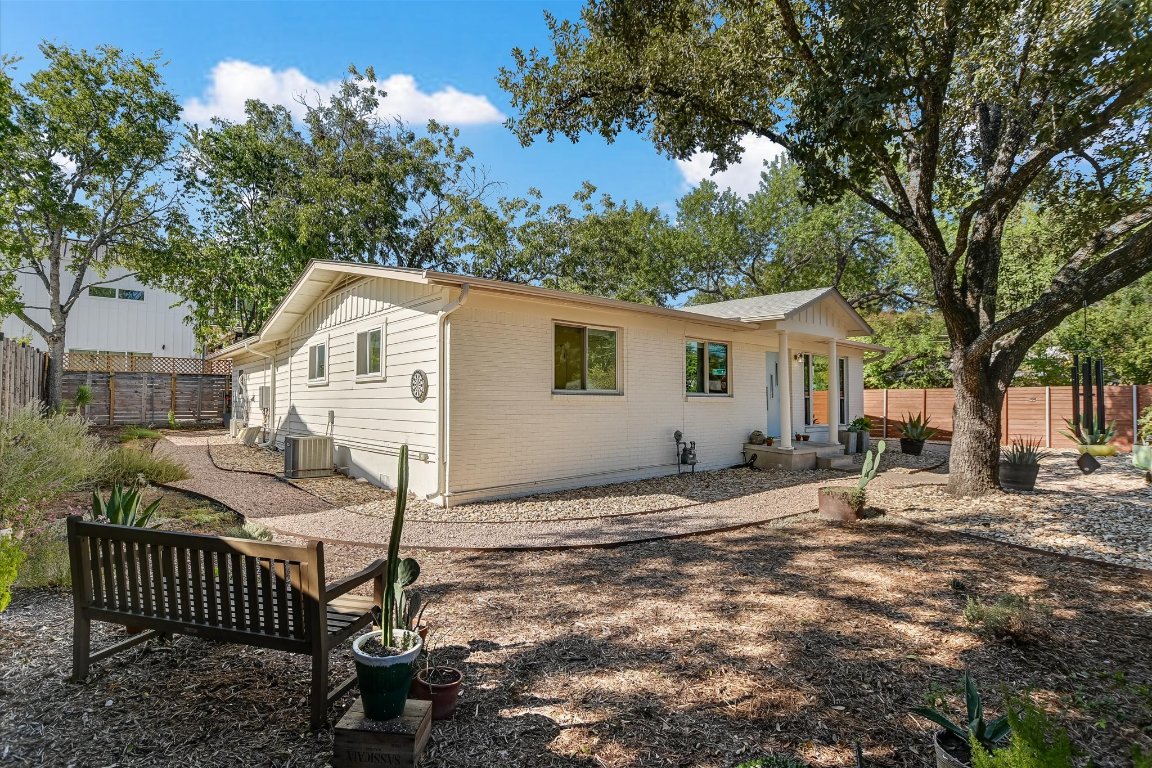807 West Oltorf Street Austin, TX 78704 - Photo 21 of 22 Rear view of house featuring a fenced backyard