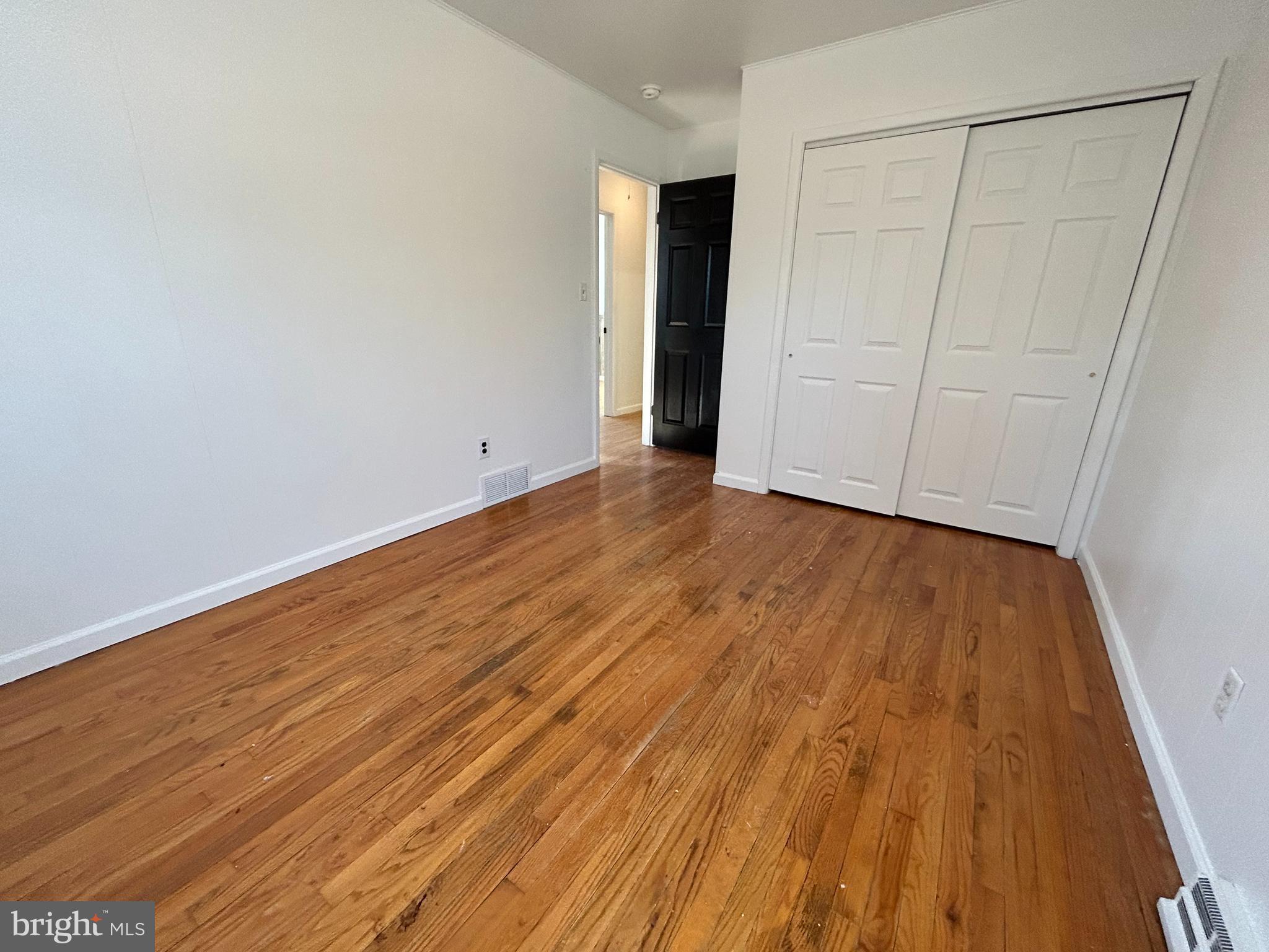 97 Sheppards Mill Road Bridgeton, NJ 08302 - Photo 24 of 27 a view of an empty room with wooden floor