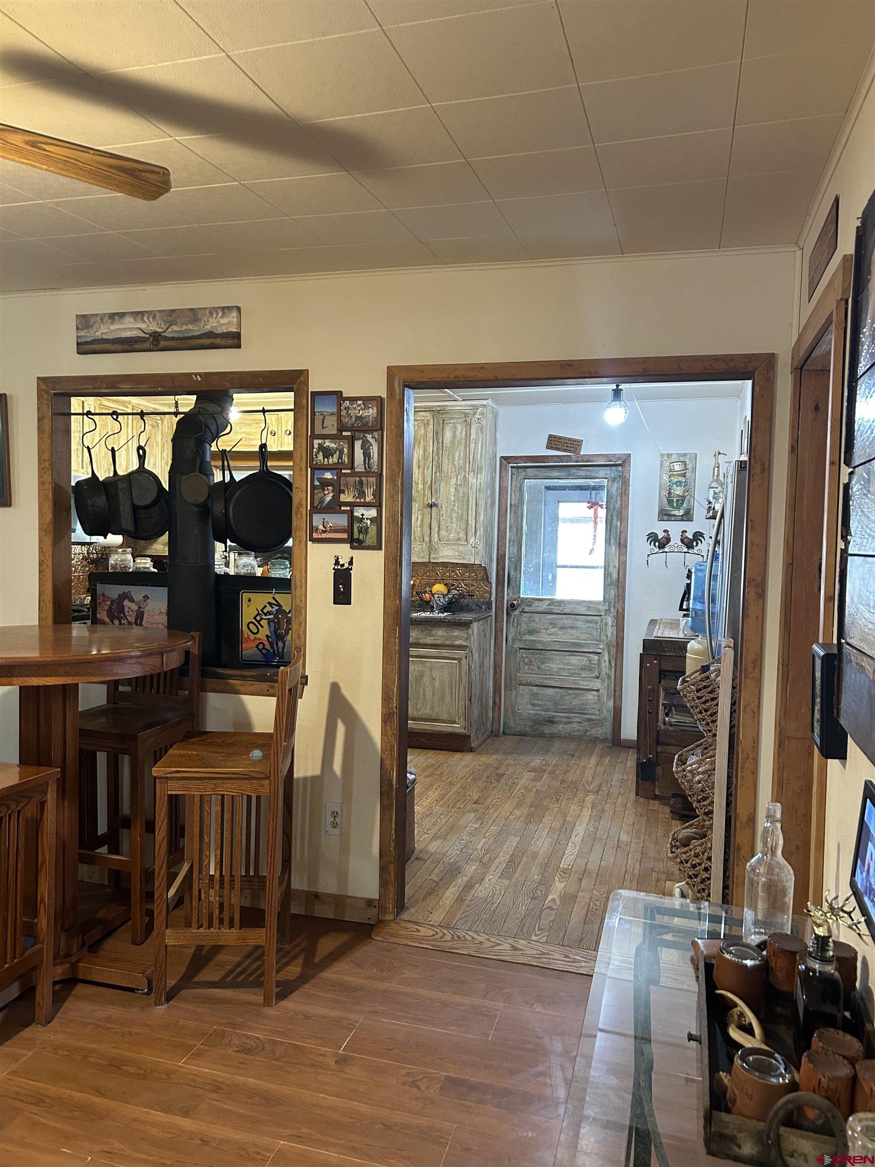 27701 BB Road Nucla, CO 81424 - Photo 26 of 29 a view of a livingroom with furniture and front door