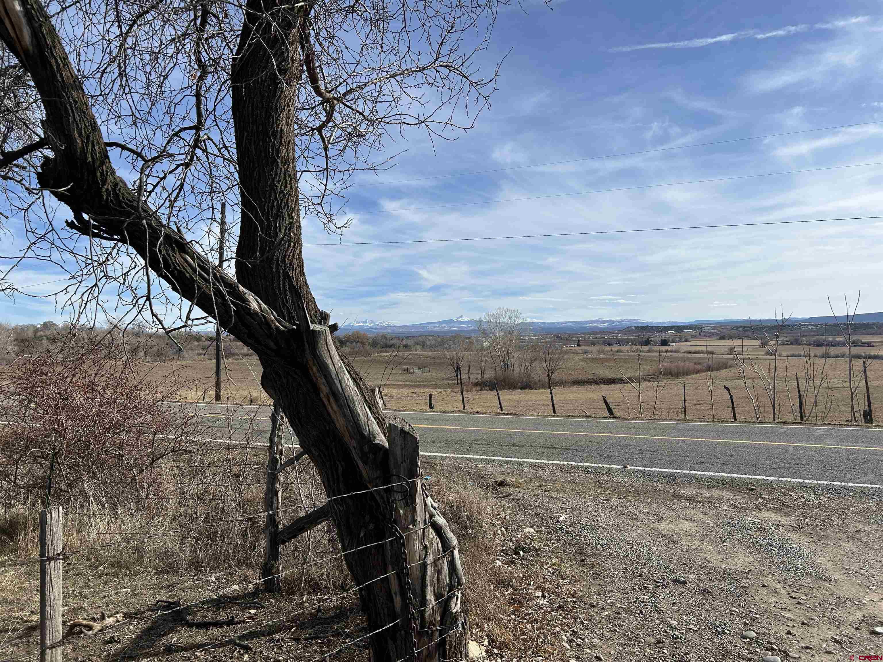 27701 BB Road Nucla, CO 81424 - Photo 3 of 29 a view of a yard with wooden fence