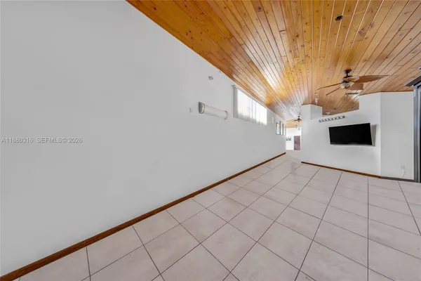 a bathroom with a bathtub and a sink