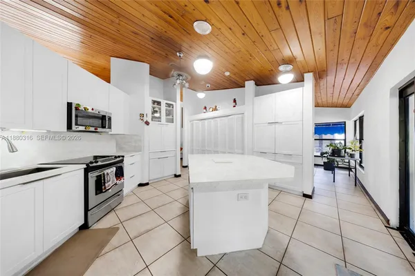 a bed room with a bed and a window