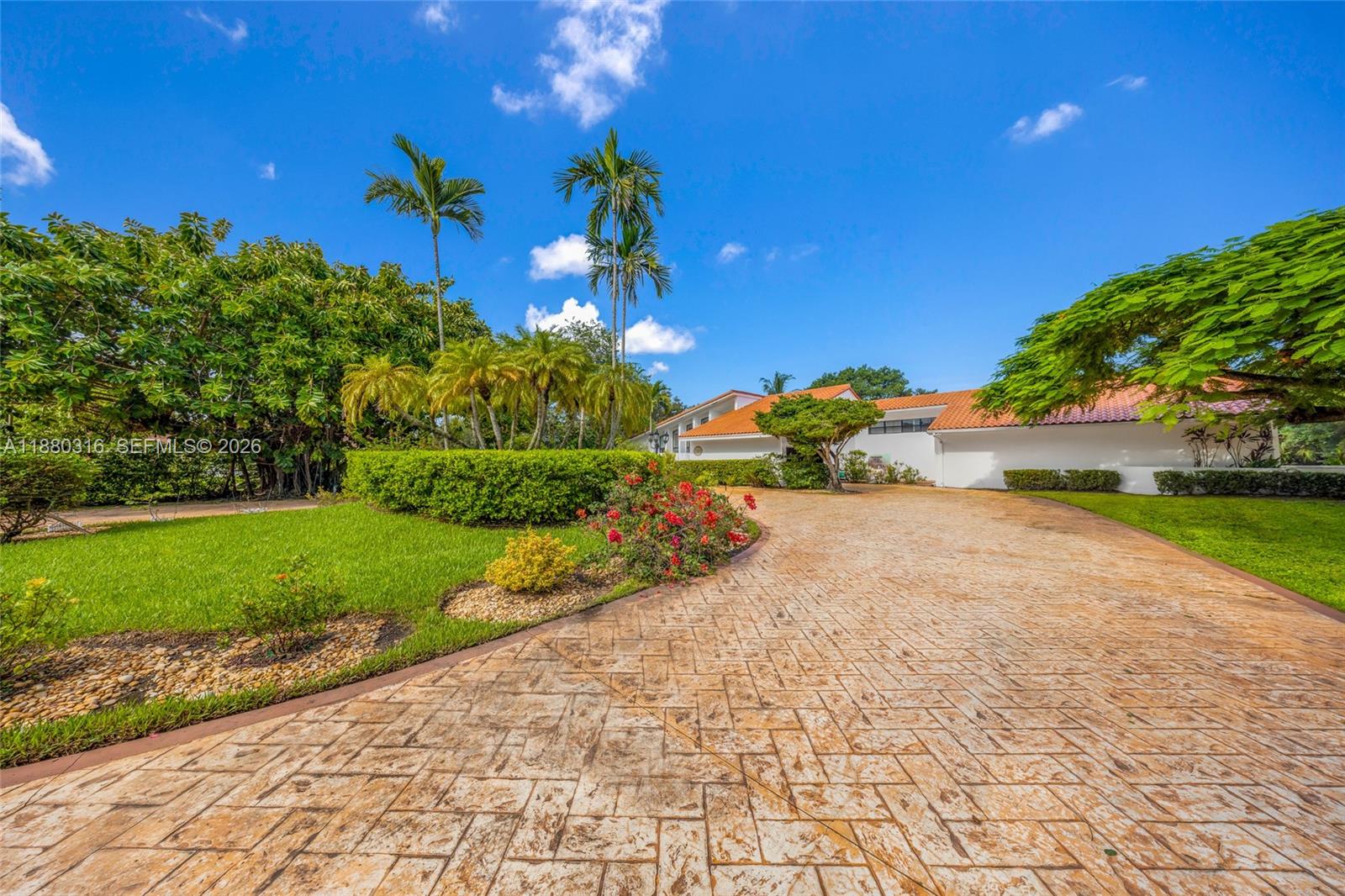 10204 Southwest 96th Court Miami, FL 33176 - Photo 2 of 54 a view of a street with a park
