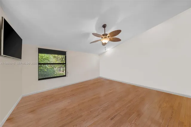 a view of an empty room and window