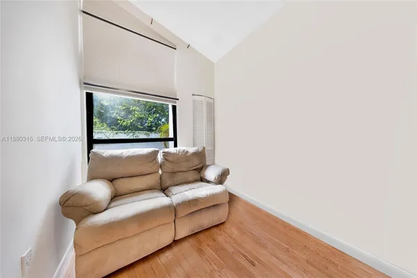 a view of swimming pool with outdoor seating